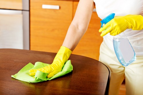 Technician using PPE during carpet cleaning work